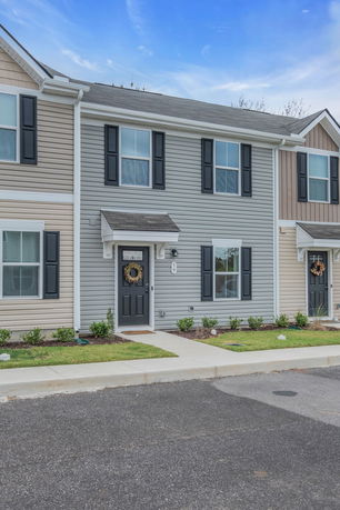 Front view of a two-story townhouse.