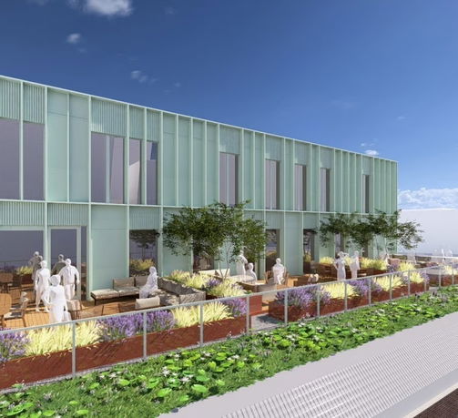 Rooftop with seating area and plants on a modern building